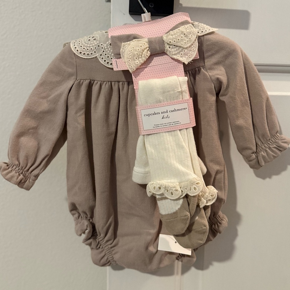Cupcakes & Cashmere Cream Baby Romper with Lace